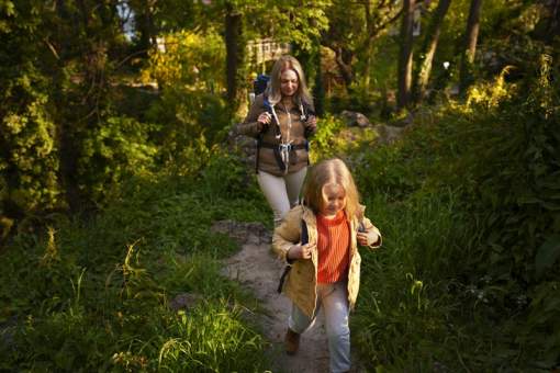 full shot woman girl exploring nature